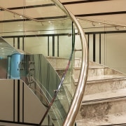 Doubletree Hilton 3 - architecture | glass | architecture, glass, handrail, line, metal, stairs, orange, brown