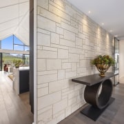 Entry with internal wall shielding the mountain views 