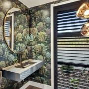 Guest bathroom with feature wall finish. - Framing 