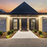 The symmetrical front door approach. - Framing the 