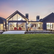 The rear of the triple-peaked home seen at 