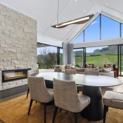 The gabled roof forms allow for high clerestory 