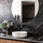 The cool stone look tiles and warm wood 