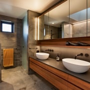 A nib wall provides showering privacy. - Warm, 