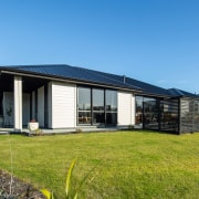 Envira Rusticated Weatherboard Home In Otago - cottage cottage, facade, home, house, property, real estate, teal