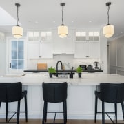 The family gather around the generous island in 