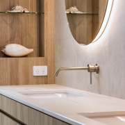 Timber display shelving holds iconic seaside elements. 