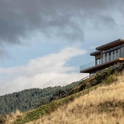 The home in its wild, beautiful setting. - 