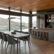 Kitchen, dining and the breathtaking landscape that directly 