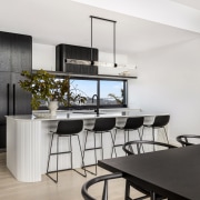 The dramatic black/white kitchen with fluting on the 