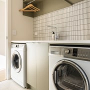 The walk-through laundry offers plenty of room to 