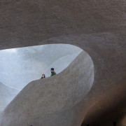 Atrium staircase detail. - Curves, collections and connections 