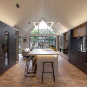 The new living volume is long, high-ceilinged and 