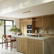 Between the sliders and skylights the kitchen is 