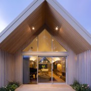 The living volume connects to the home's front 