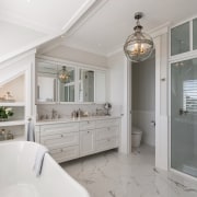 Both tapware and pendant are in keeping with 