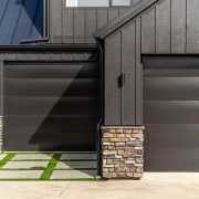 Two garages and two garage doors. - Black 