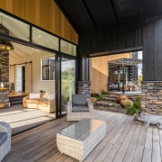 Rear deck and view across to bedroom wing. 