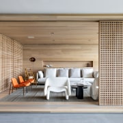 The intimate social space features wood on floor, 