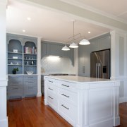 Traditional detailing on the island and panelled cabinetry 