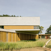 The home has a strong sculptural presence. - 