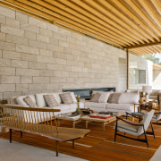 Living spaces defined by area rugs. - Stretching 