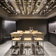 Wine cellar – contemporary new home by Urbane ceiling, dining room, interior design, table, black, gray