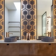 A bold pattern metallic wallpaper adds the Mid 