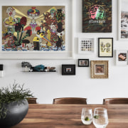 Eclectic artworks cover the walls. - Shared spaces 