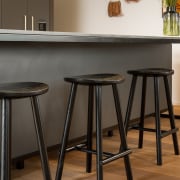 Smart but simple stools serve the island/breakfast bar. 