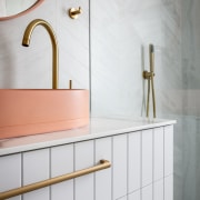 The concrete tabletop basins add a pink touch 