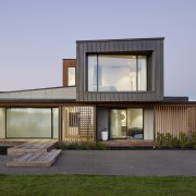 Front entrance with two storey bedroom wing to 