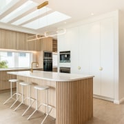 The showhome's designer kitchen is bathed in natural 