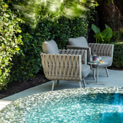 Spa-side relaxation. - Under the spreading gum tree 