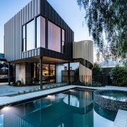 Pool, spa, sculptural staircase and contemporary accompanying residence. 