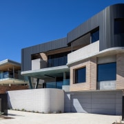 The inclusion of a basement garage elevates the 