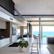 Modern kitchen island with breakfast seating. 