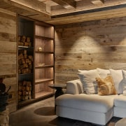 Living area detail showing open shelving accentuated with 