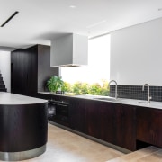 The kitchen benefits from individualistic details and materials 