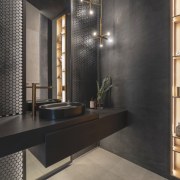 Warmth is infused into the space through brass 