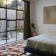 The master bedroom is bathed in natural light 