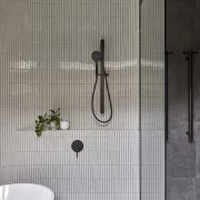 The light cream vertical finger tiles of the 