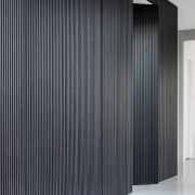 Blackened timber battens add character, creating feature walls 