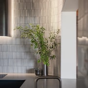 Mosaic/kitkat tiles provide a cohesiveness in colour and 