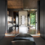 In this renovated master suite, the new bathroom architecture, interior design, black, gray