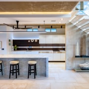 ​​​​​​​This long, linear Poggenpohl kitchen, precision tweaked and architecture, ceiling, countertop, interior design, kitchen, lobby, gray, marble, concrete, marble benchtop