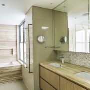 ​​​​​​​The ensuite cabinetry in this master suite continues architecture, bathroom, home, bathroom design, white, master suite, timber cabinetry, wood, timber, travertine, Giles & Tribe Architecture