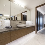 From bed, through compartmentalised separate his and hers countertop, floor, interior design, kitchen, real estate, sink, gray