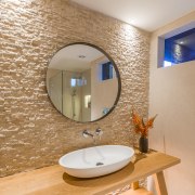 ​​​​​​​The split-face travertine wall was water-blasted in key bathroom, interior design, sink, Travertine, Natalie du Bois, design