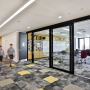 In King’s School’s new Centennial Building, sliding doors interior design, lobby, real estate, gray